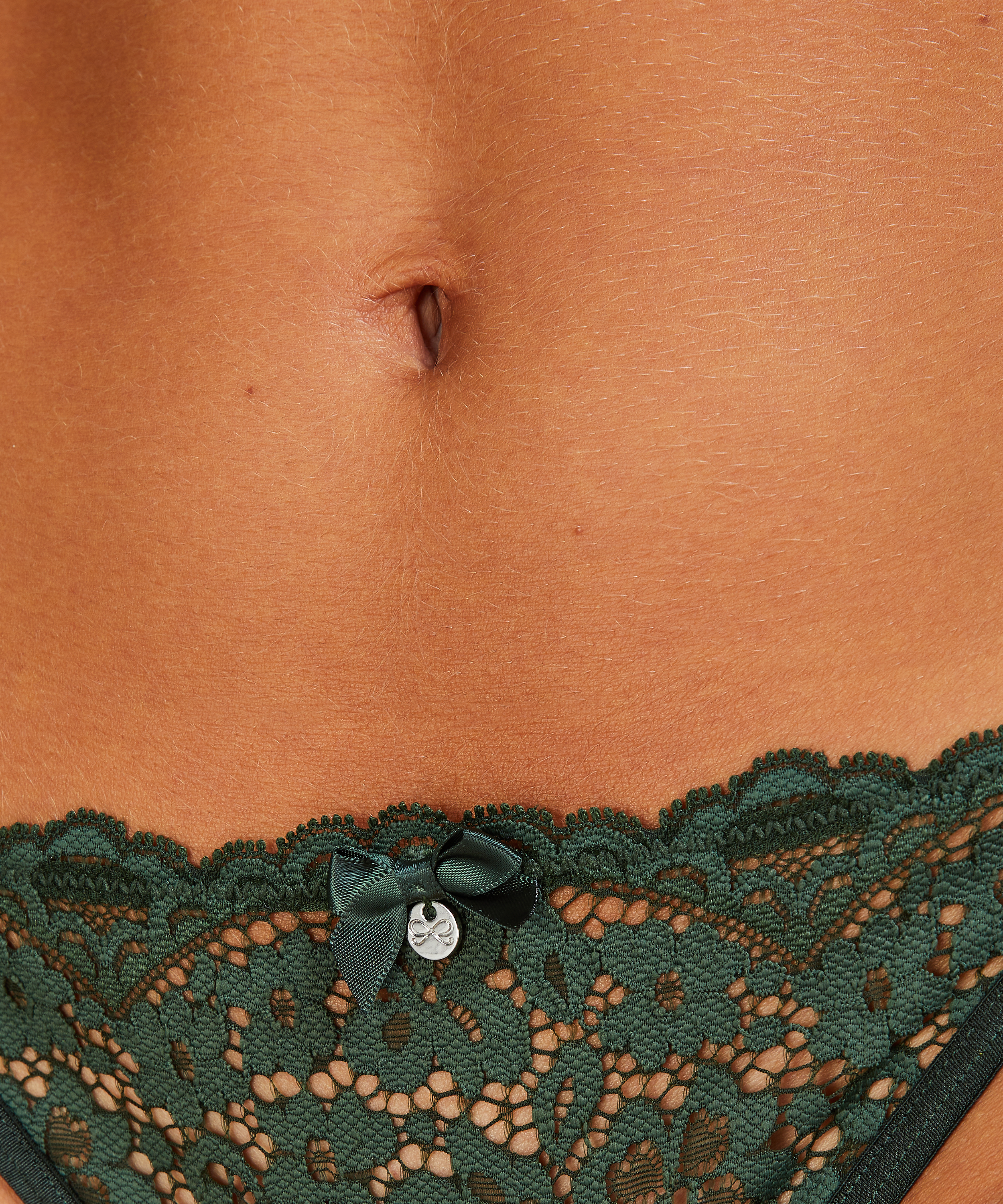 Tanga string Rose, Vert, main