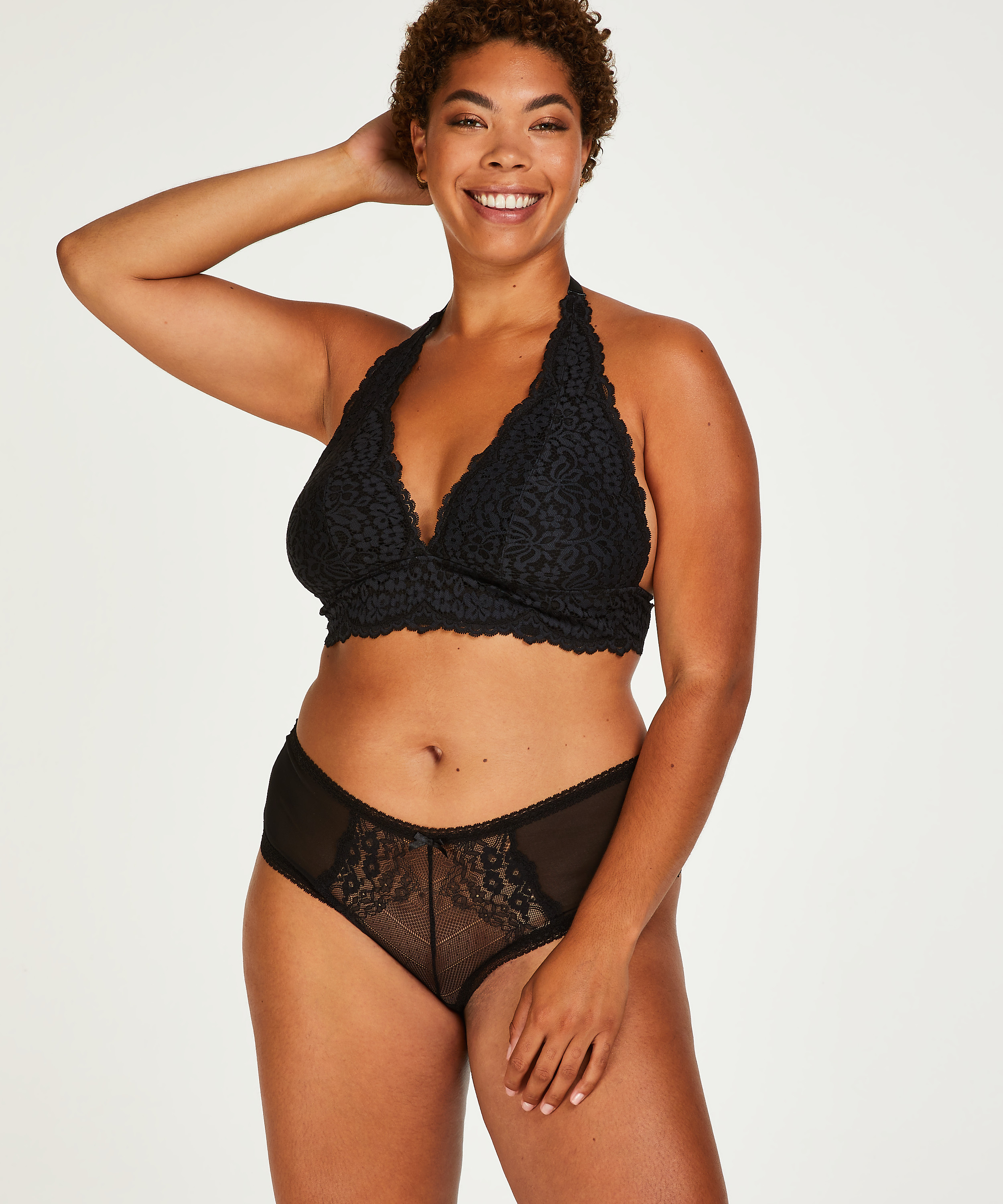 Slip brésilien Cali Curvy, Noir, main