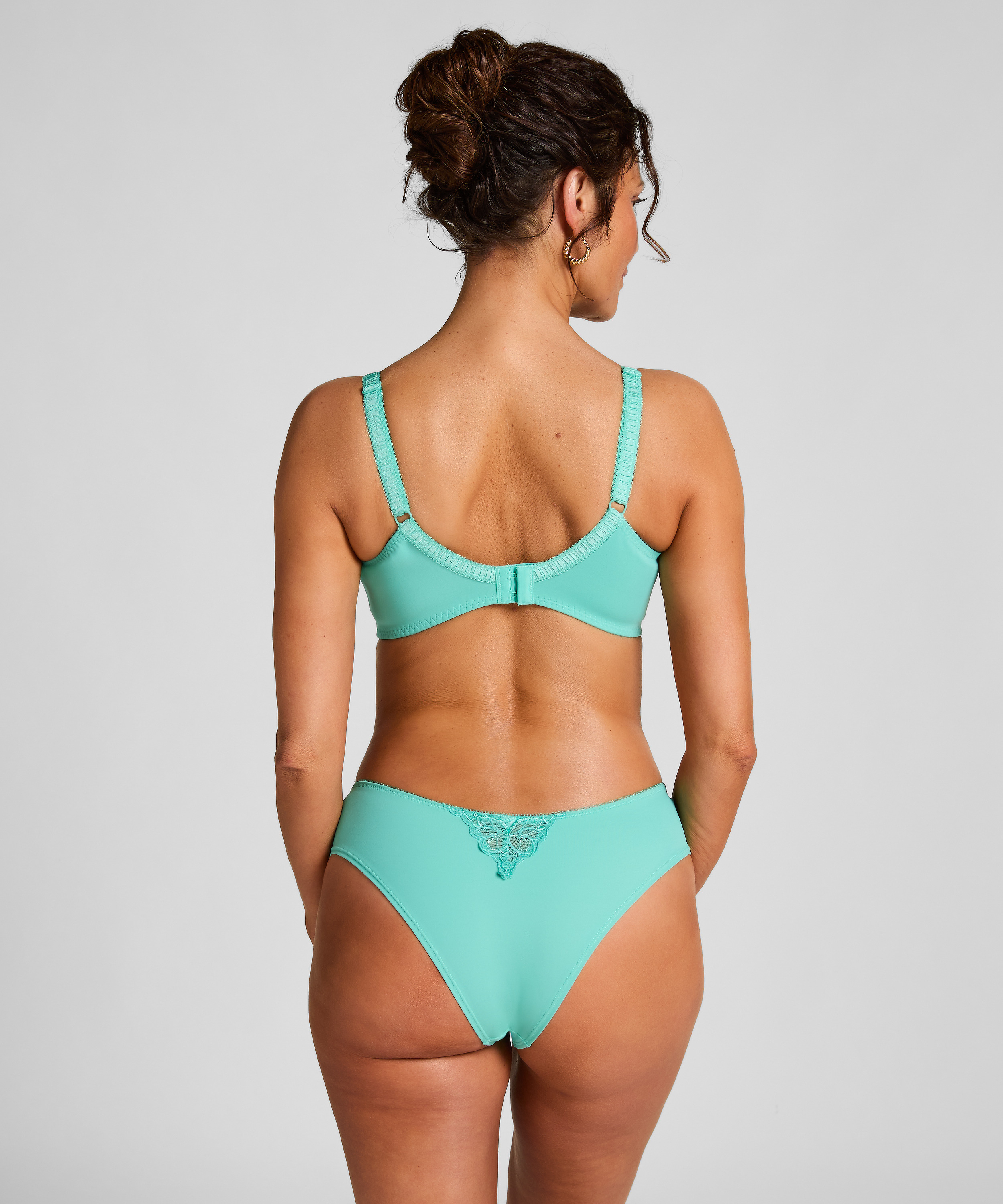 Slip brésilien Diva, Vert, main