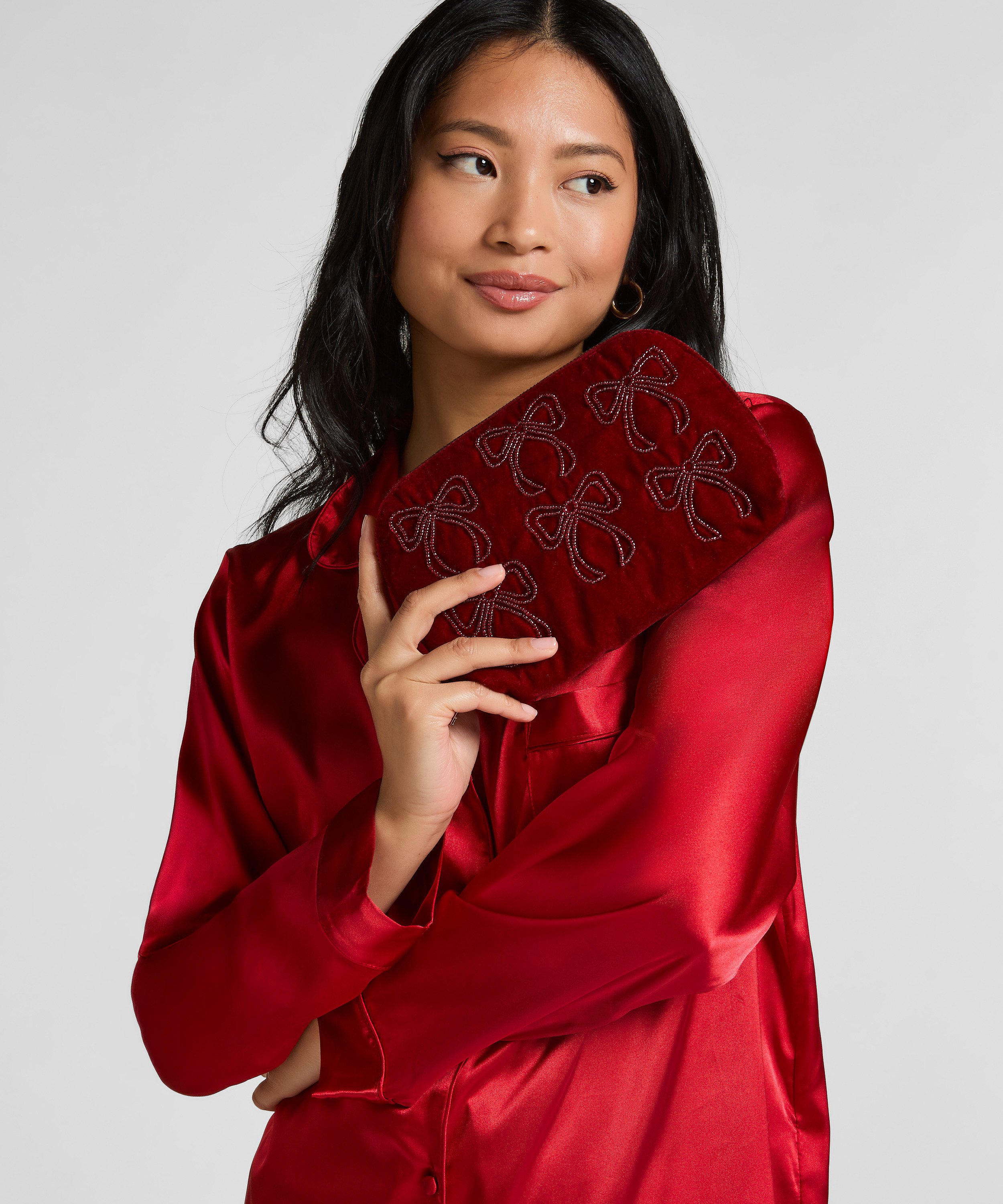 Trousse de maquillage &agrave; n&oelig;uds, Rouge, main